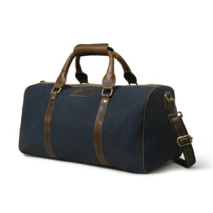 Handcrafted Campbell blue canvas and buffalo leather duffel bag with brass hardware