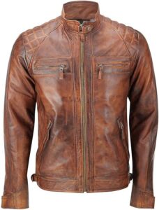 Men's vintage distressed brown leather biker jacket with quilted shoulder panels, zip pockets, and a stand collar.