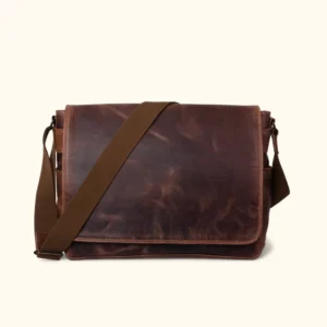Roosevelt Large Legacy Leather Messenger Satchel in vintage brown with trolley strap and shoulder pad.