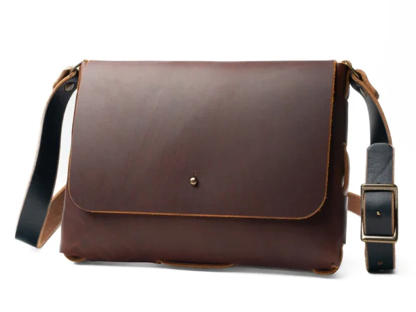 Everyday Leather Satchel in dark brown full-grain leather with a front flap and adjustable shoulder strap.