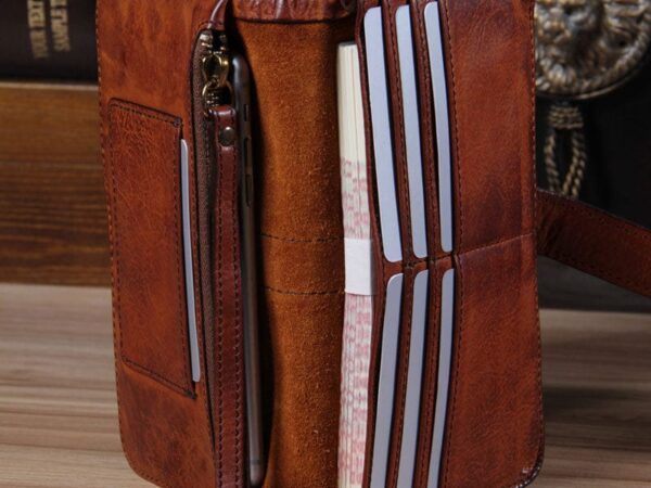 Vintage brown leather wallet with zipper pocket and multiple card slots